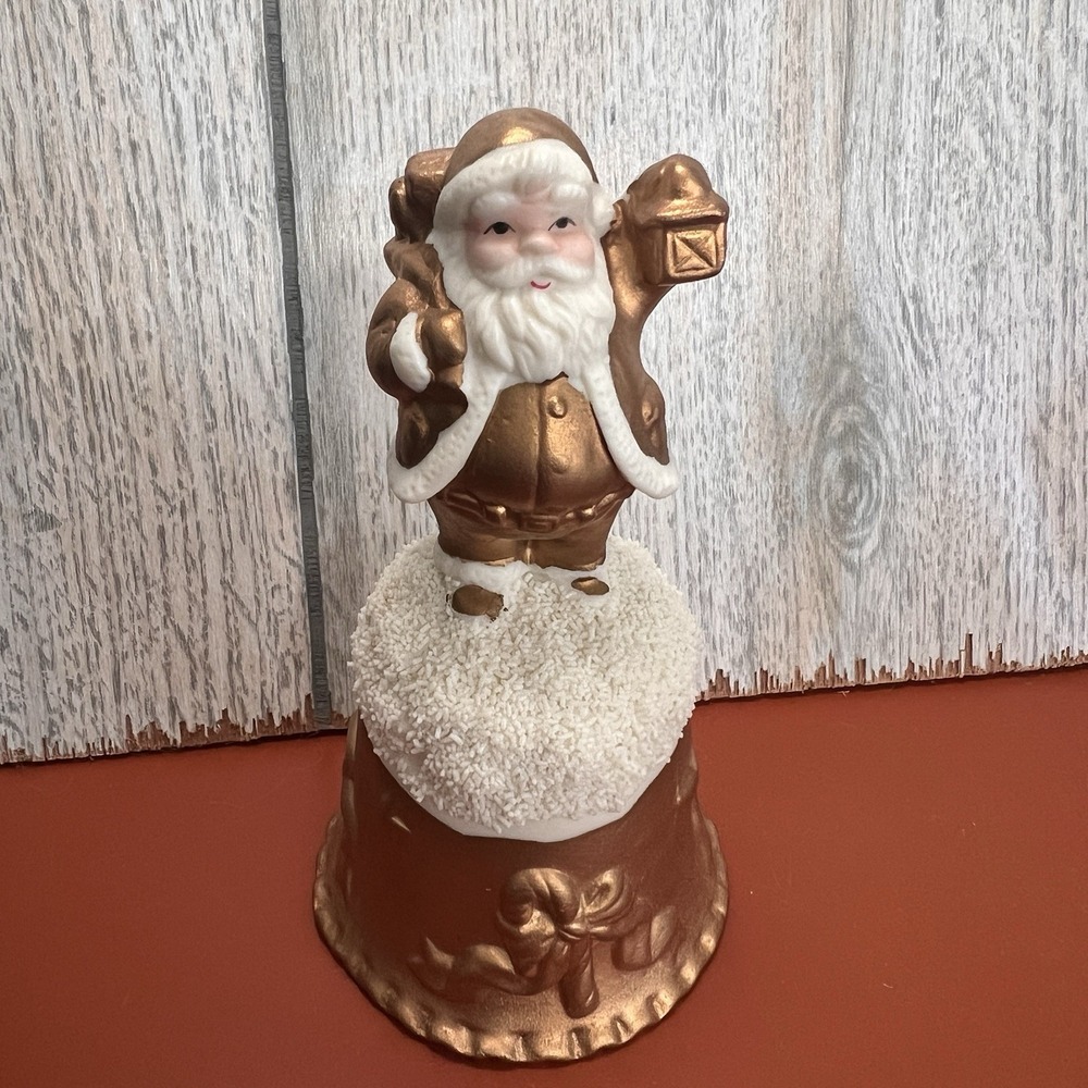 Vintage World Bazaars Inc. Holiday Collection Gold Suited Porcelain Santa Bell